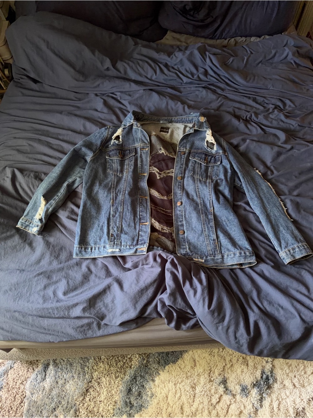 Distressed Blue Denim Jacket With Fishnet Accents